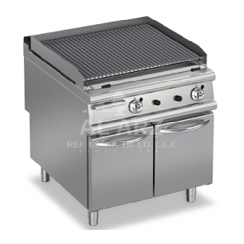 Gas Charcoal Grill On Open Cupboard